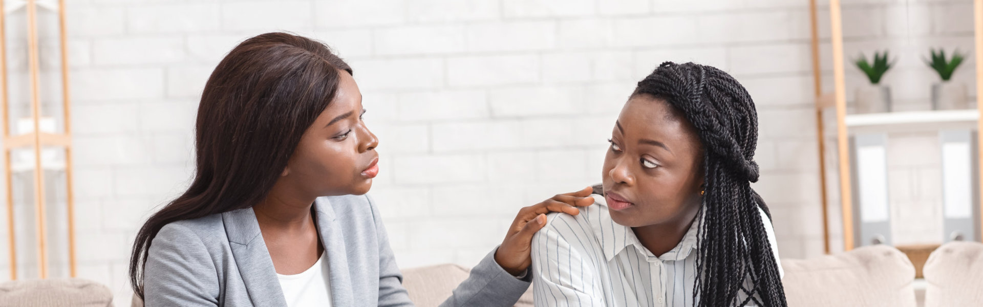 therapist comforting woman