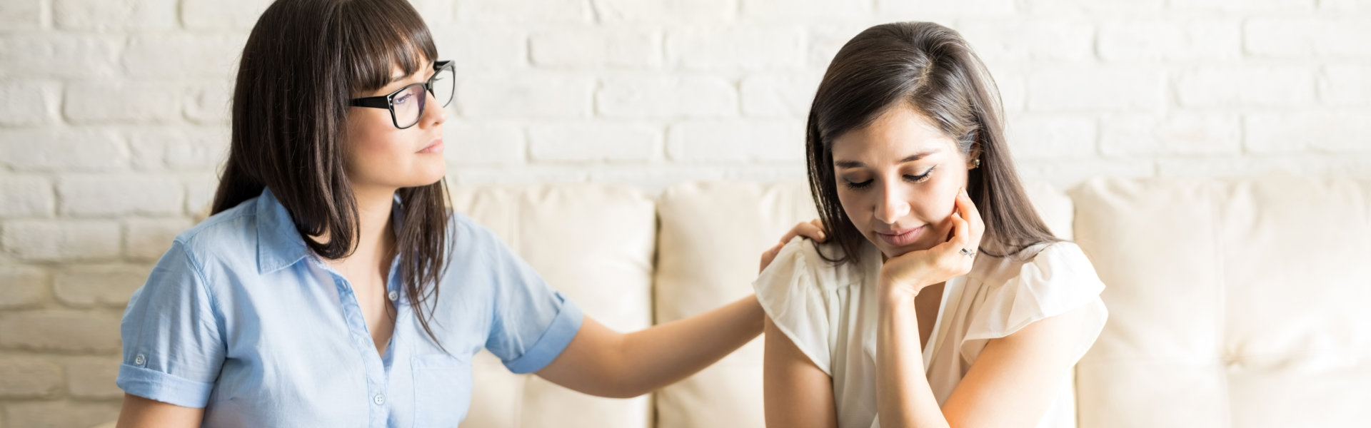 therapist comforting woman